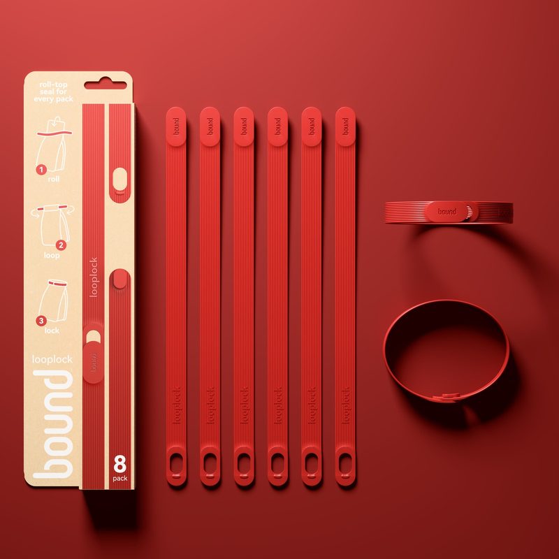 Strawberry Looplocks with their 8-pack: six laid flat and two locked in a loop