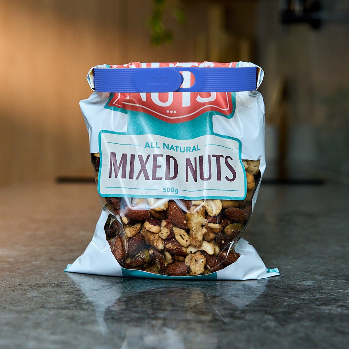 A bag of mixed nuts rolled shut with a Blueberry Looplock