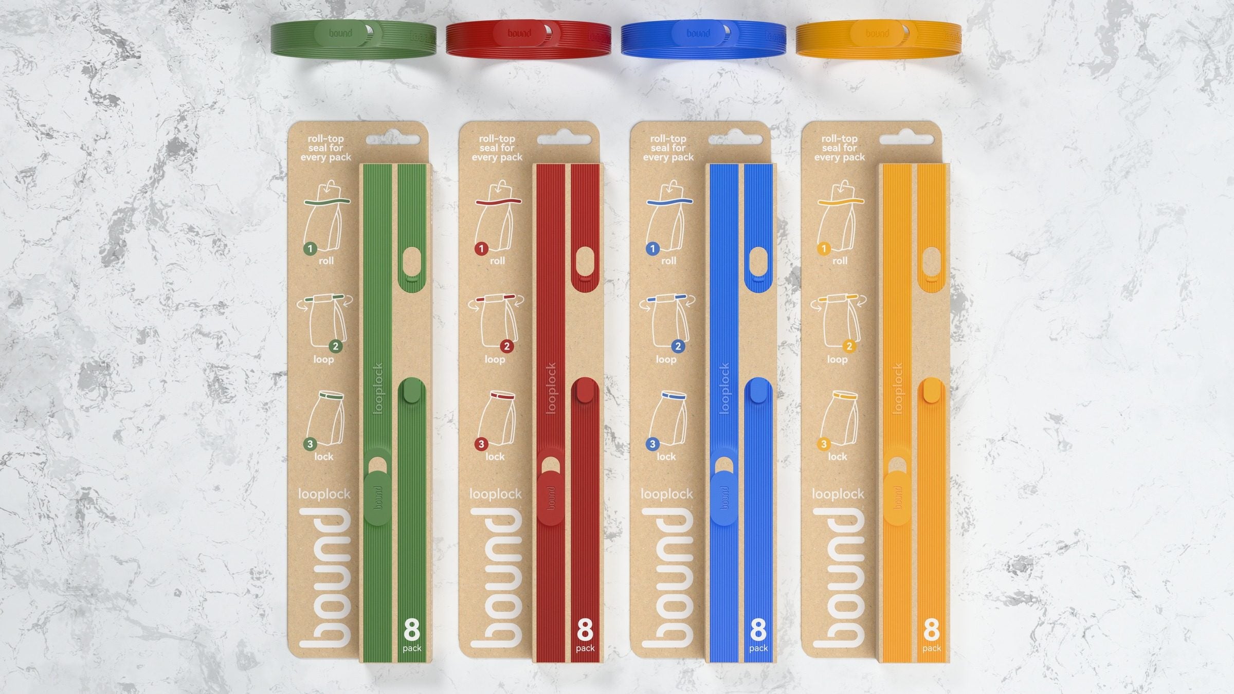 Four Looplock packs on a marble benchtop, Kiwi, Strawberry, Blueberry and Mango, each with a locked loop